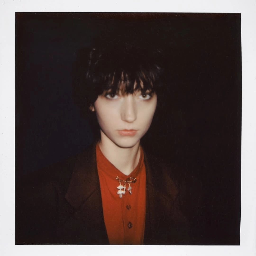 Polaroid — portrait against black